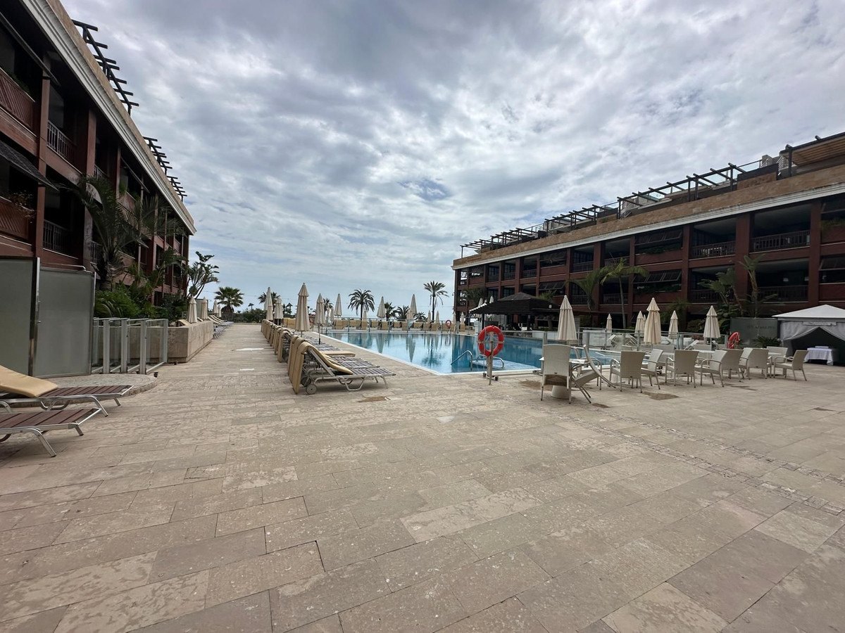 The pool deck and its sun loungers