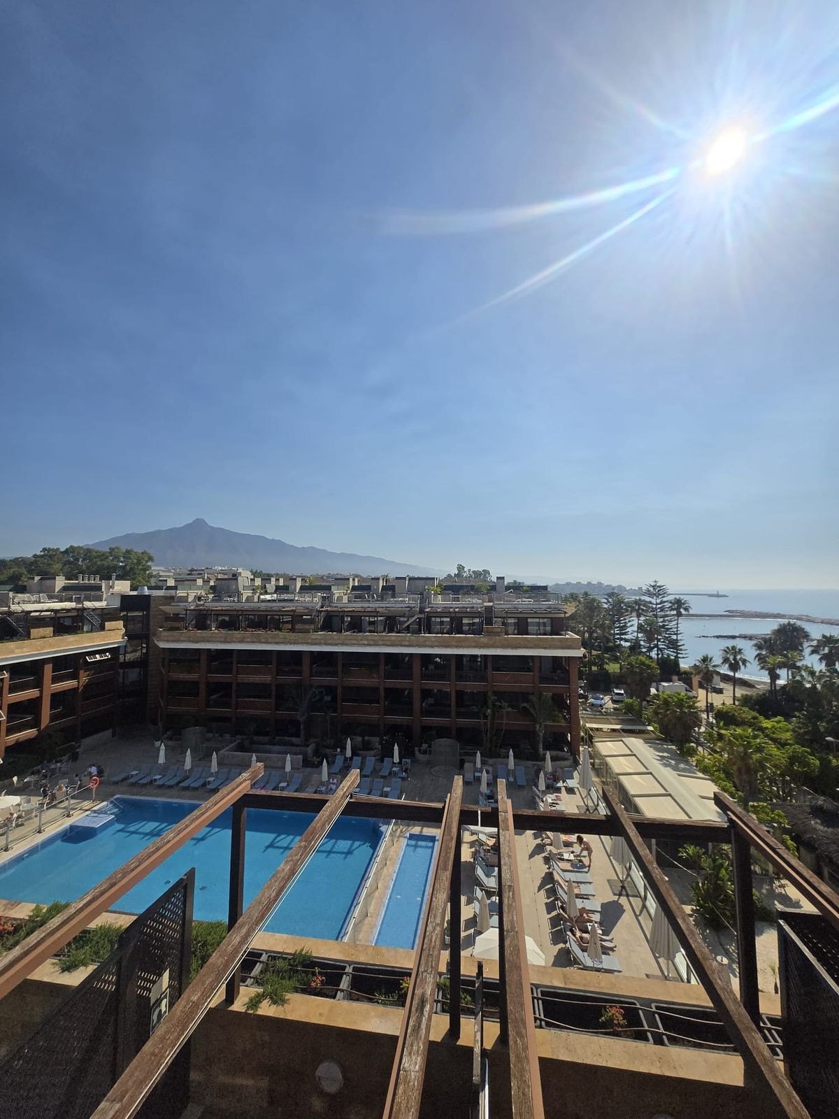 The hotel's pool below, La Concha behind