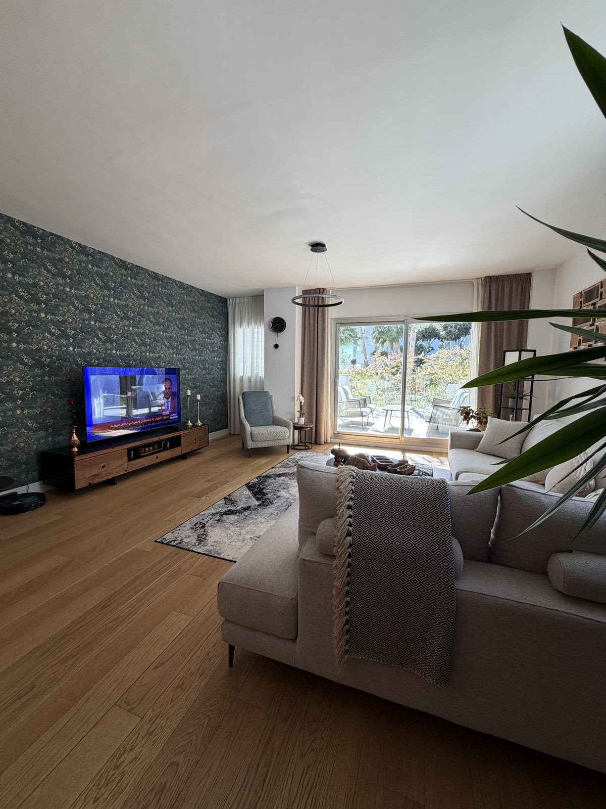 The living room, looking out to the terrace