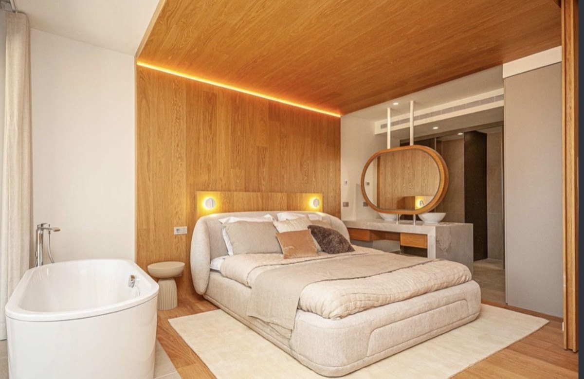 The master suite beyond the sliding wall