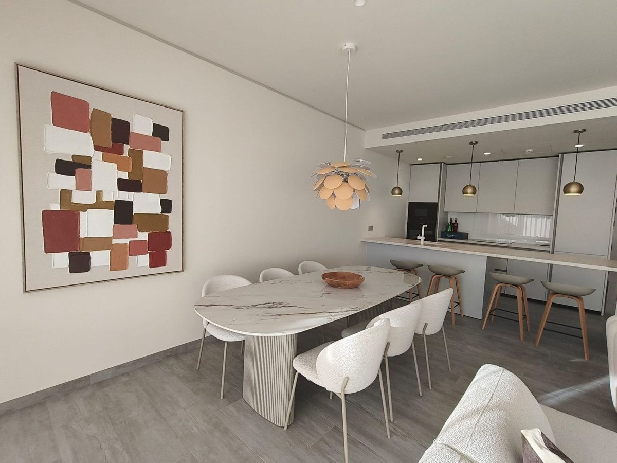 The dining table beside the kitchen