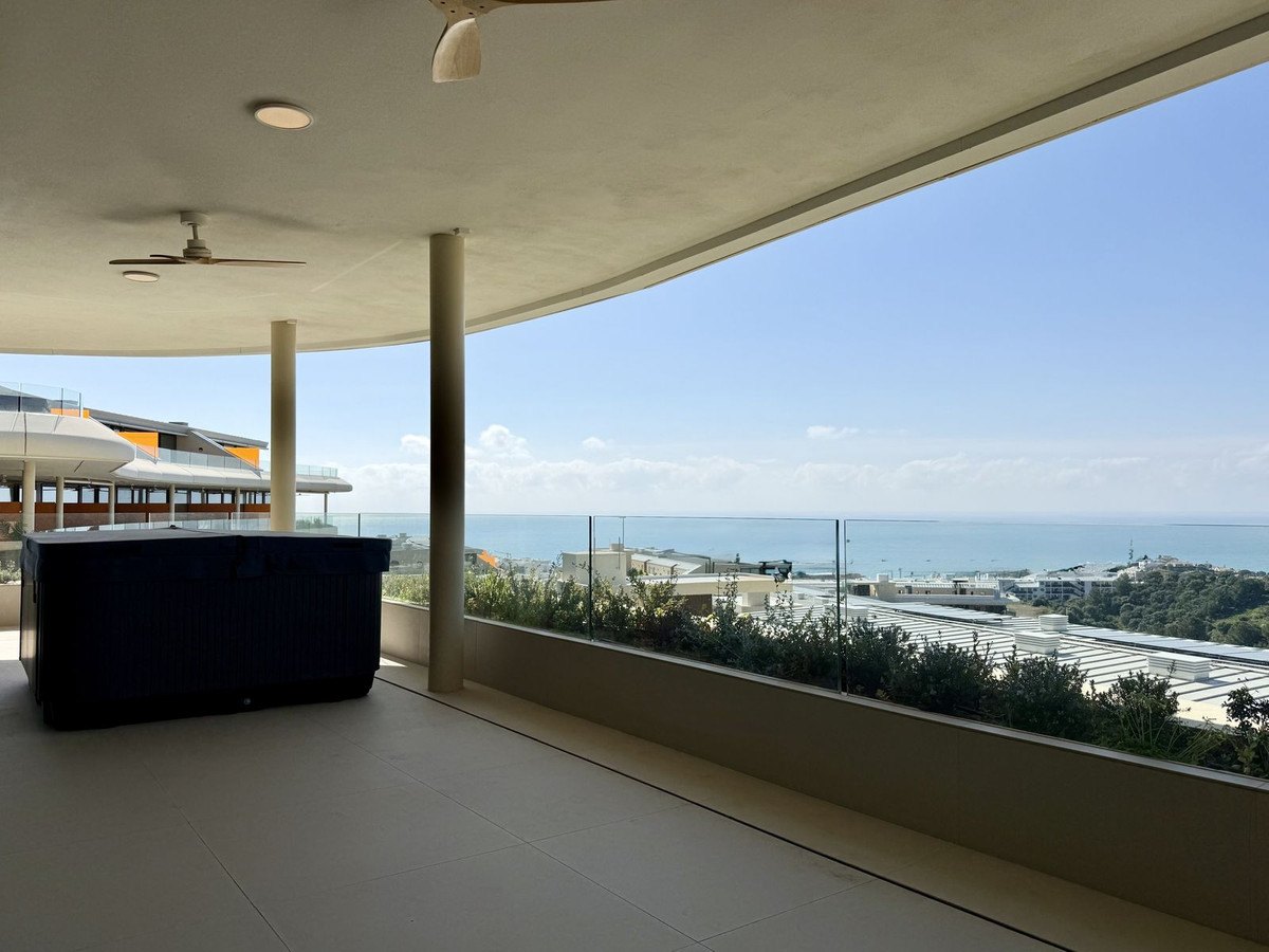 The covered terrace, the sea beyond