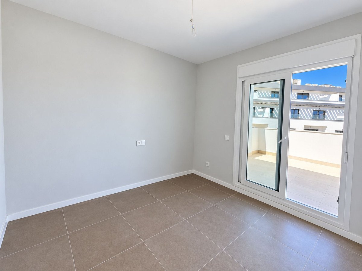 A bedroom opening onto the terrace