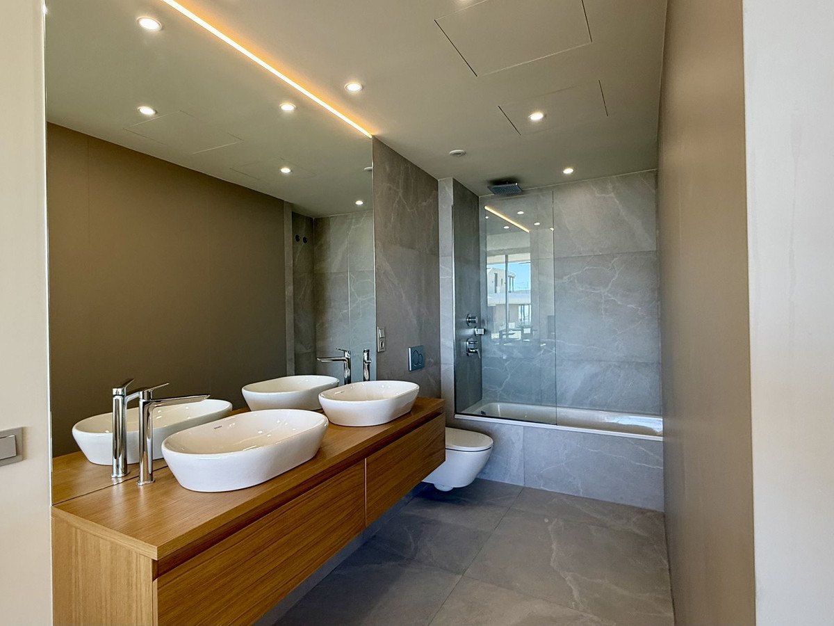 A bathroom with twin basins