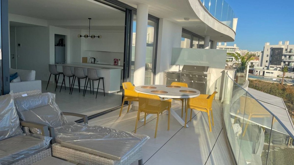 The living room opens to the terrace