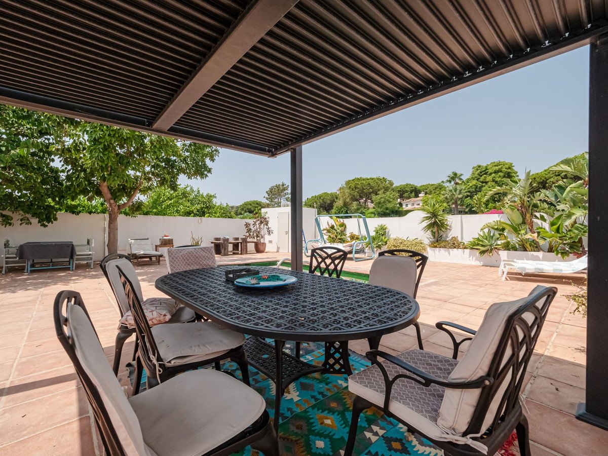 Dining under the pergola