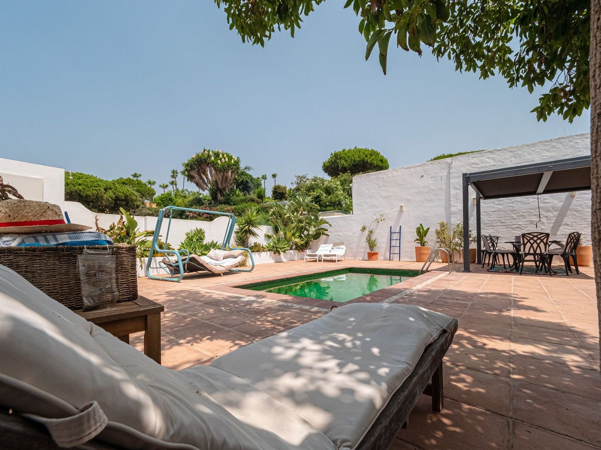 Sun loungers on the terracotta terrace