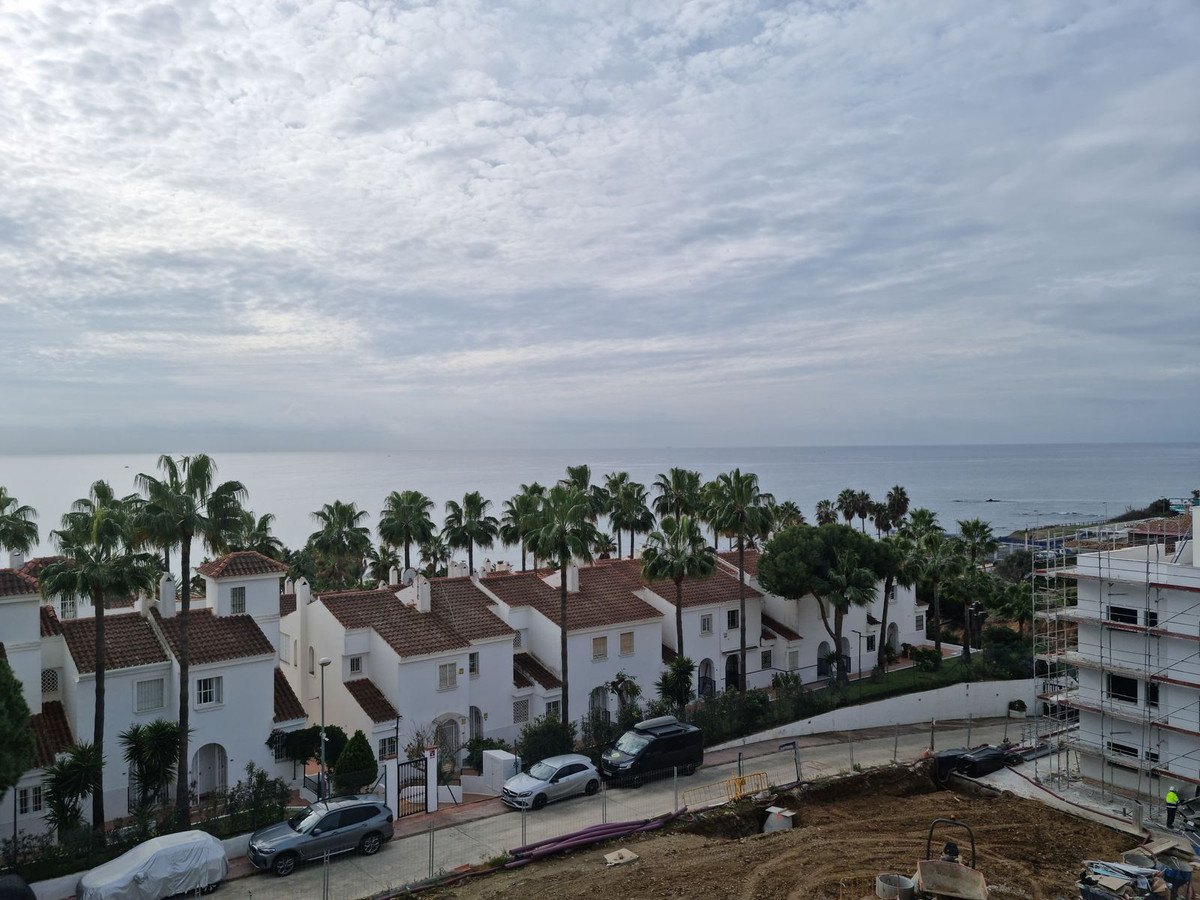 A grey morning over the rooftops to the sea