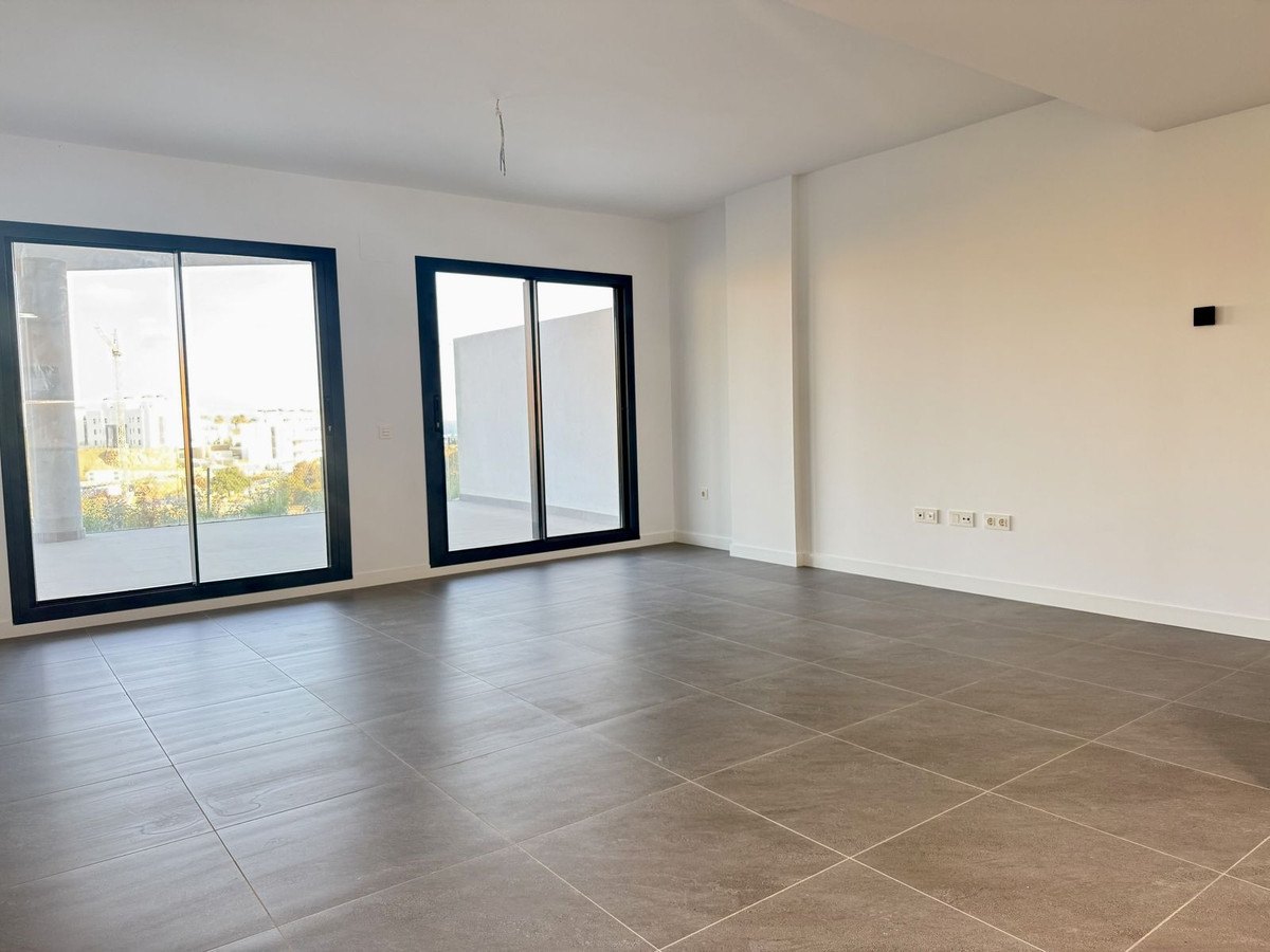 The living room with its sliding doors to the terrace