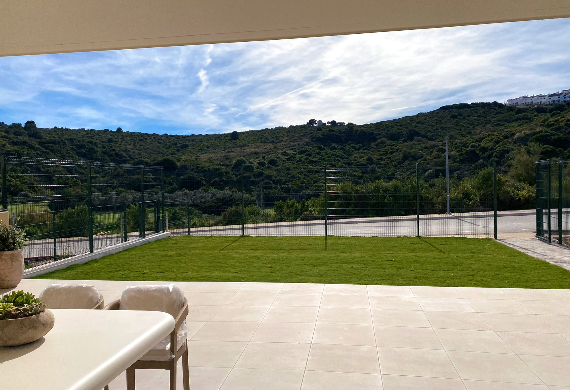 2–4 bedroom apartments in Casares — the finished terrace looking over the hills