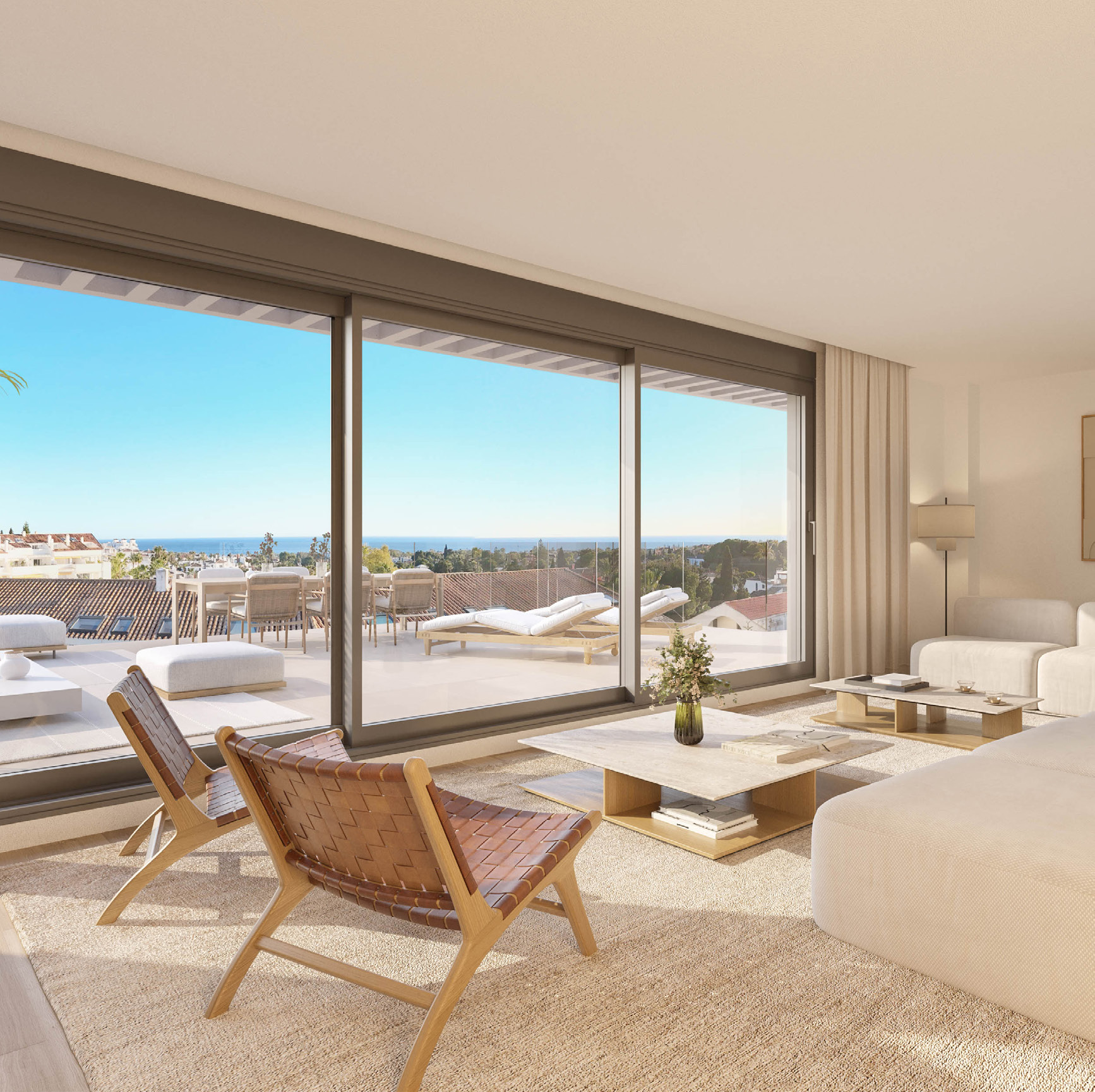 Penthouse terrace with the sea beyond