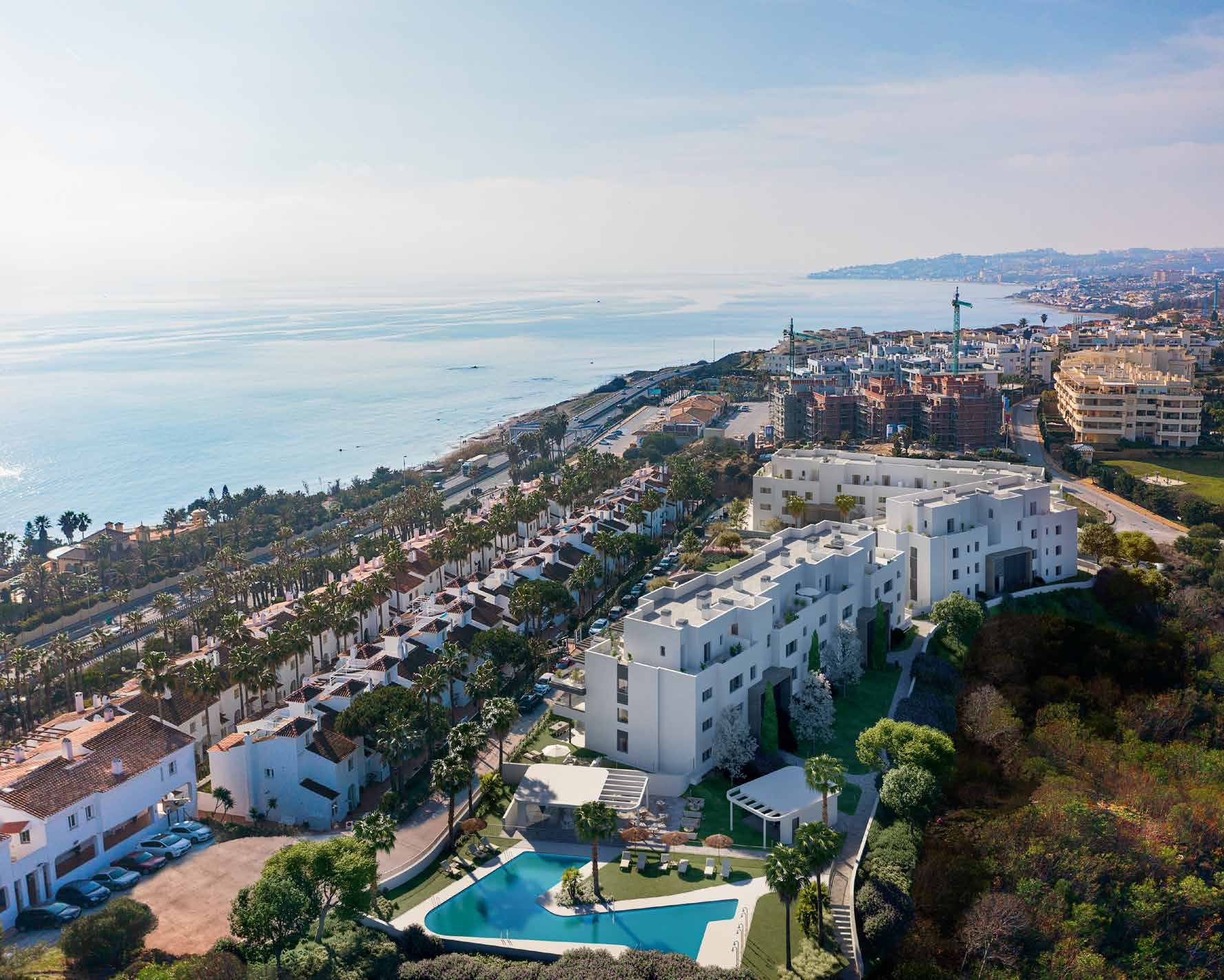 The coast of Mijas from the air, the blocks on the slope above the beach