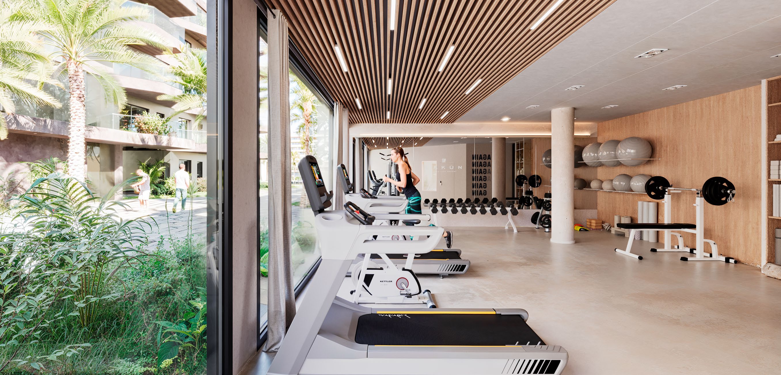 The gym, opening to the gardens