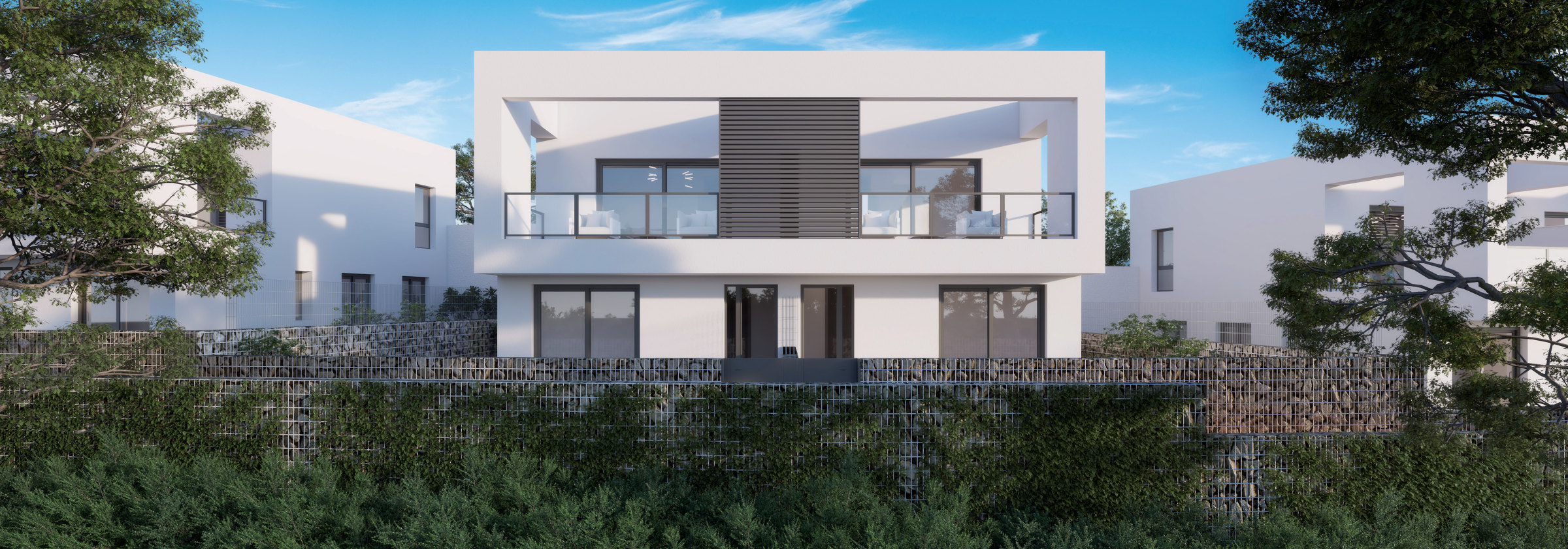The rear of the houses: two floors, flat roofs, terraces on both levels