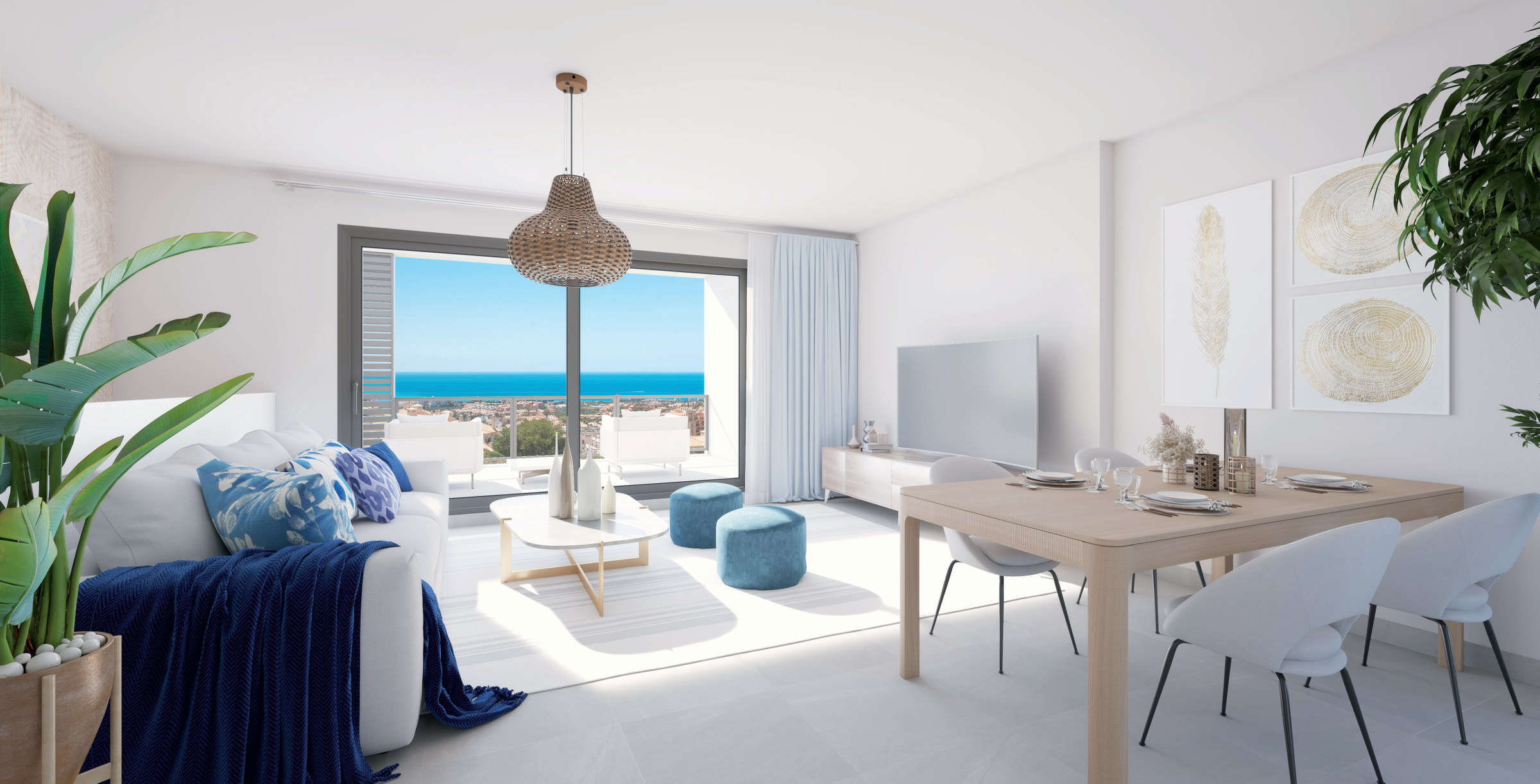 Living and dining, with the sea beyond the terrace